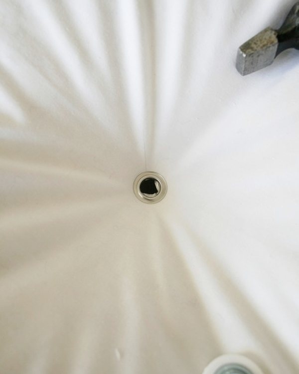 A grommet set into the centre of the pillow insert