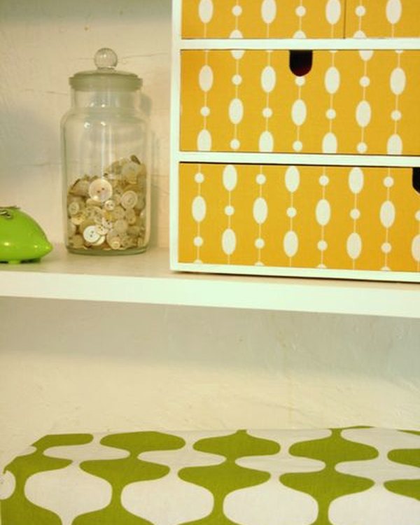 The finished chest with yellow patterned drawer fronts